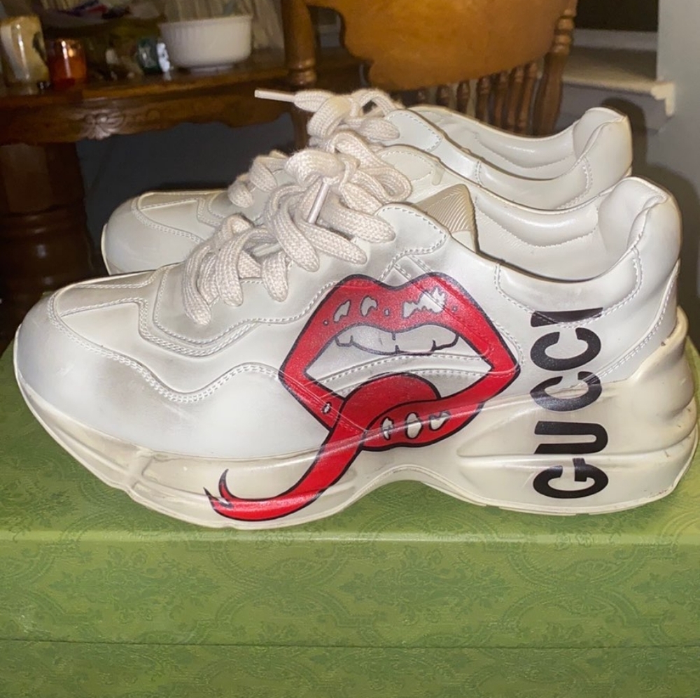 Gucci sneakers size 8.5 wore once,good condition they come with the scuffs.